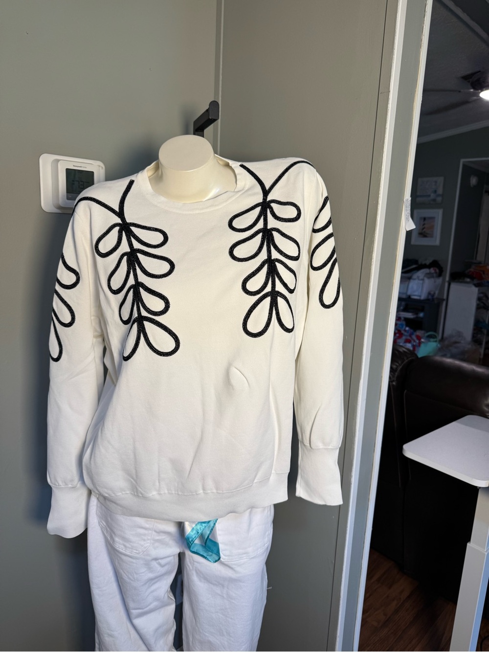 Aleeza Paris Women's White Sweatshirt with Black Embroidered Loop Design